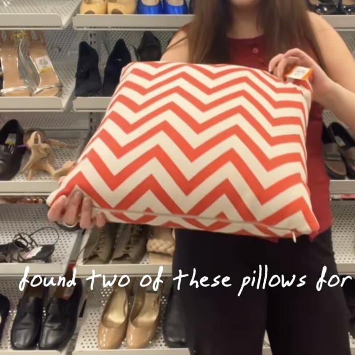 Red and white chevron throw pillows, from Alex Bailey's thrift haul